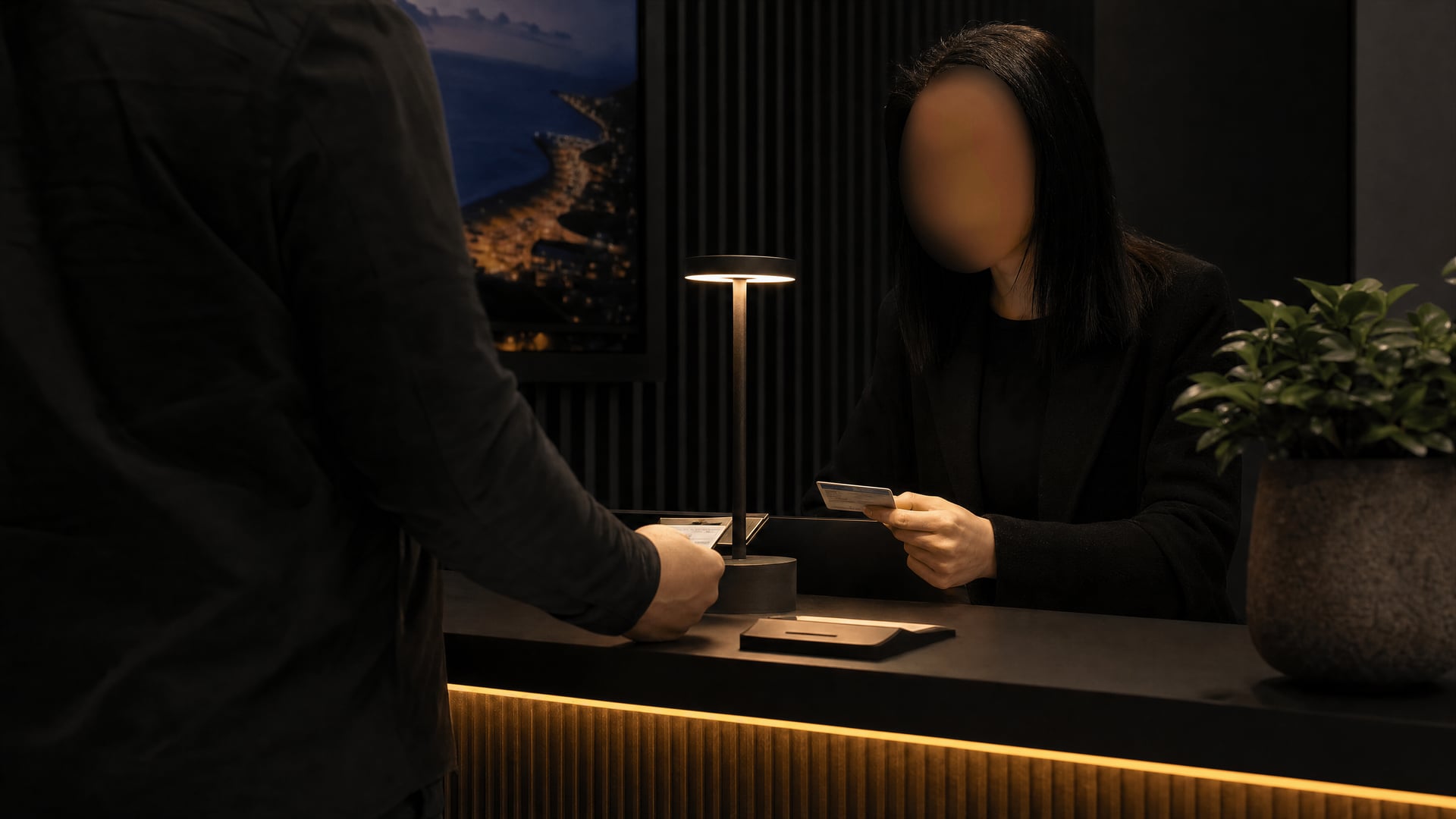 Visitor checking membership information at a private club